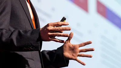 Close-up of a business person presenting behavioral health information